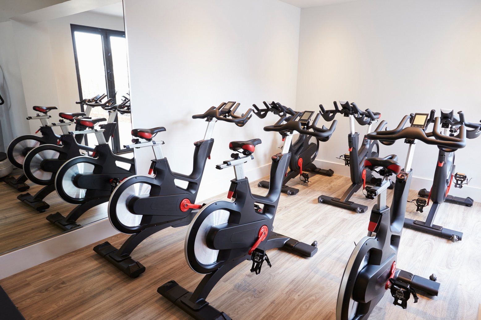 Row of Spinning Bikes in Gym